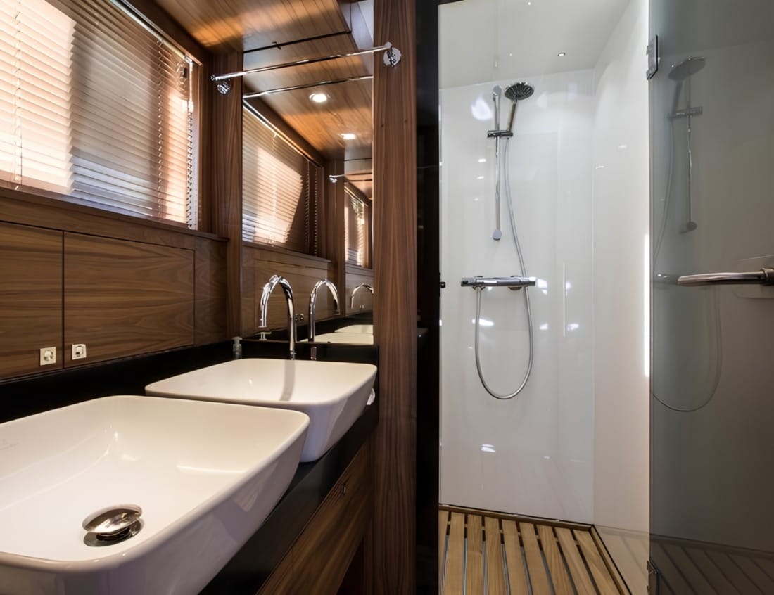 Bathroom of a VDHY Explorer 2400 (EX-Series) with double sinks and shower.