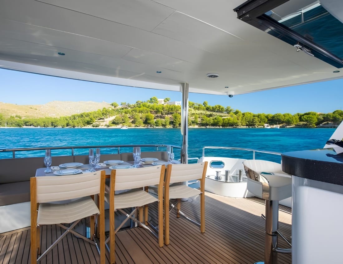 Aft deck dining area of a VDHY Explorer 2400 yacht (EX-Series)