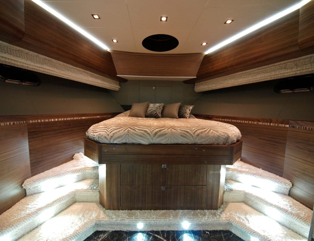 Bedroom of a Superior 2400 Van der Heijden Yachts with double bed and wood interior