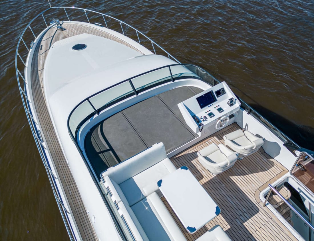 Top view of the Phantom 70 flybridge with helm station and seating area