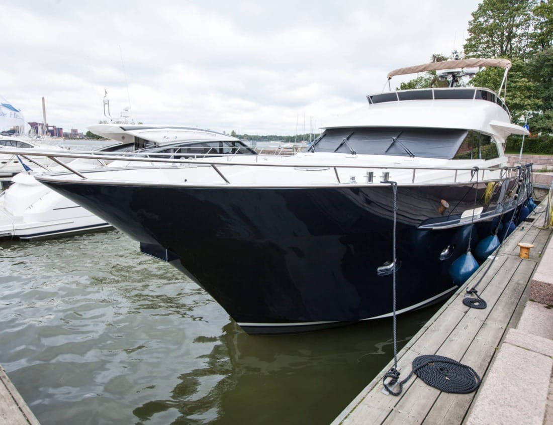 Superior 2100 Van der Heijden Yachts docked at a marina.
