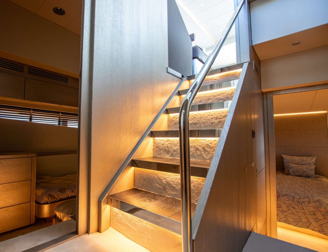 Staircase inside a Phantom 70 yacht leading to the main deck