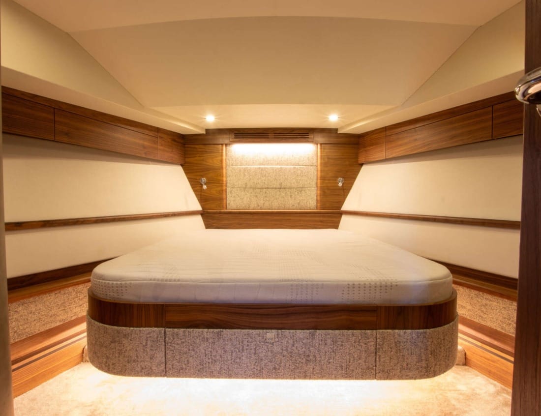 Bedroom of an Exclusive Deluxe 1700 - Exclusive Series with double bed and wood interior