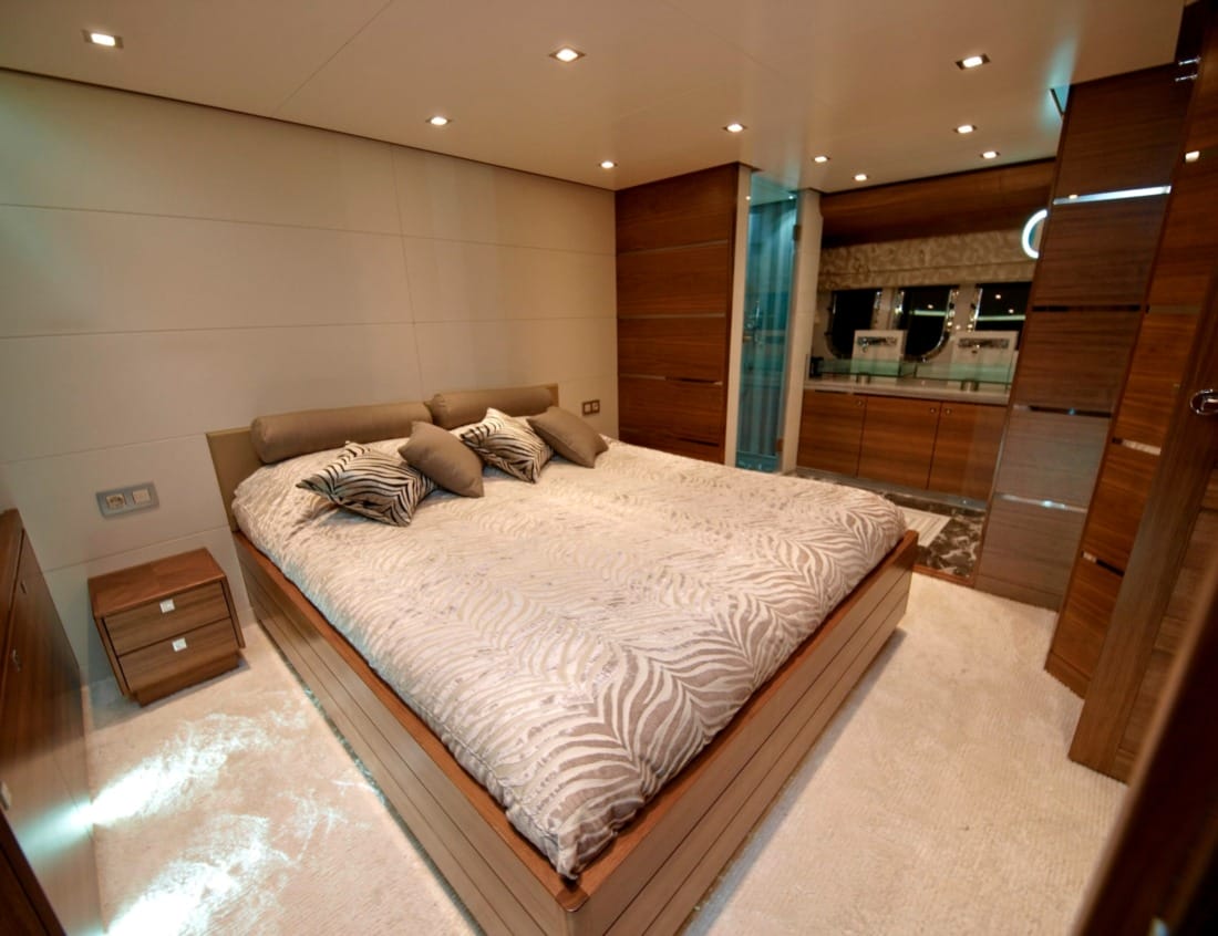 Bedroom of a Superior 2400 Van der Heijden Yachts with double bed and en-suite bathroom