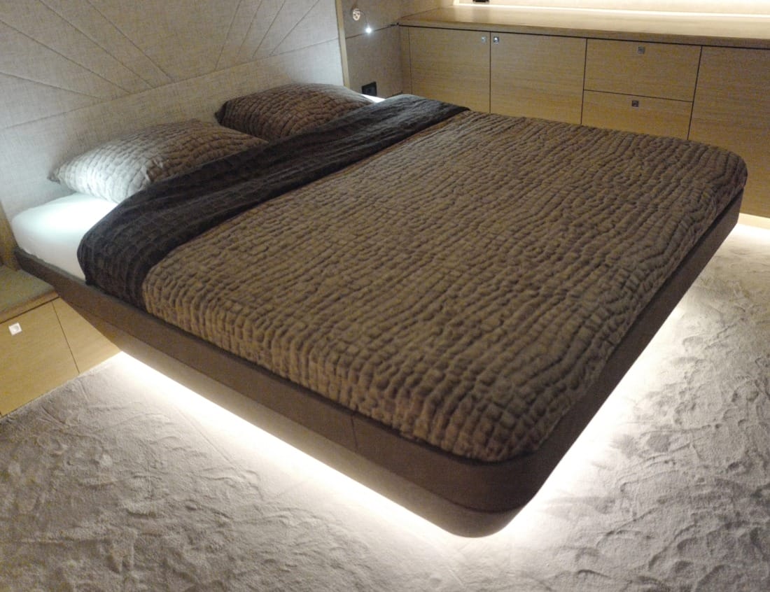 Traveller 63 - Traveller Series with bed, built-in seating, storage cabinets and ambient lighting.