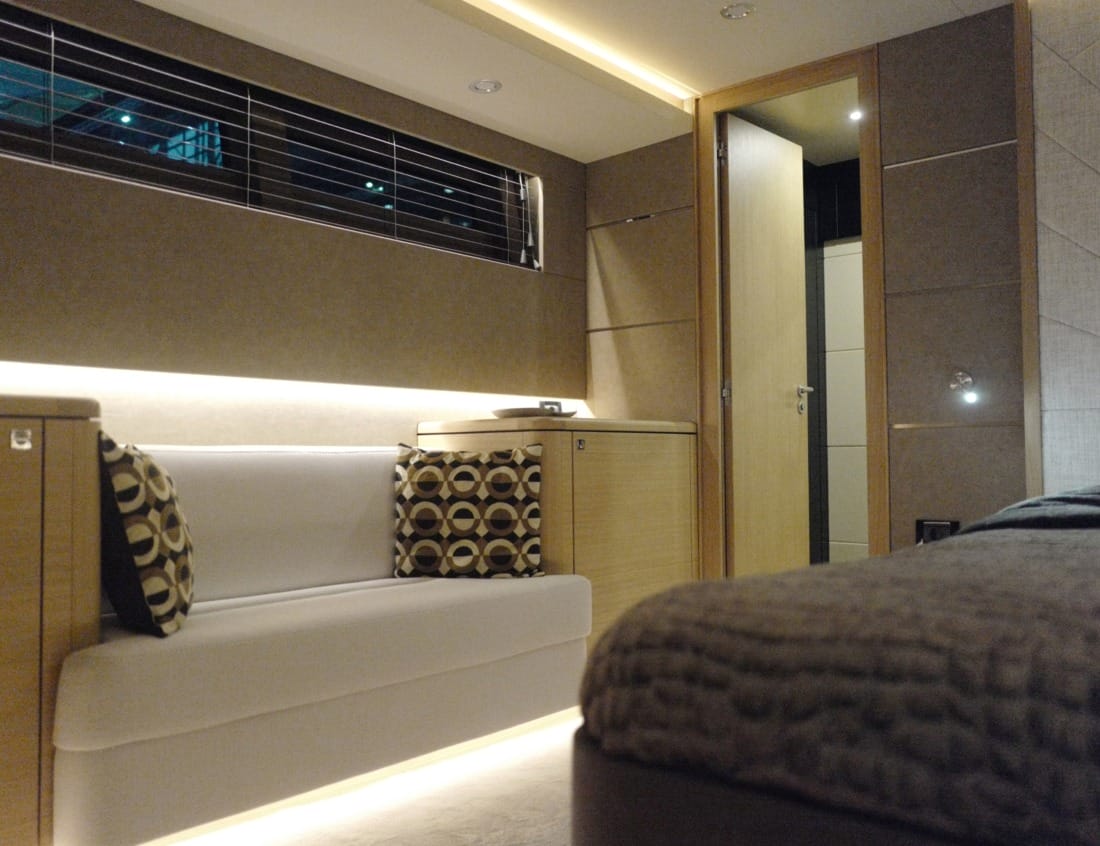 Traveller 63 - Traveller Series with bed, built-in seating, storage cabinets and ambient lighting.