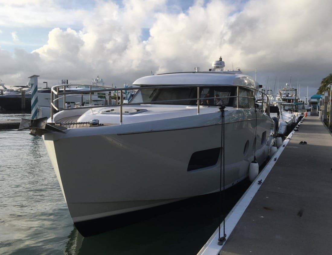 Front view of a Hayden Sedan - Hayden Series moored at a marina.